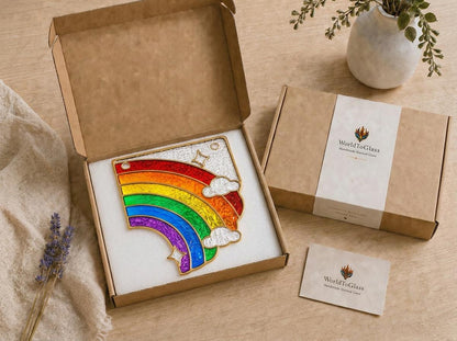 Rainbow window corner suncatcher arranged for indoor display