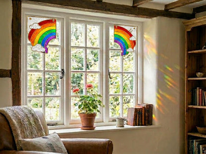 Rainbow stained glass window corner suncatcher in a styled home interior