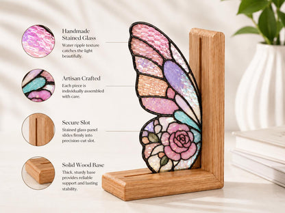 Pink Floral Butterfly glass bookend set near a bright window