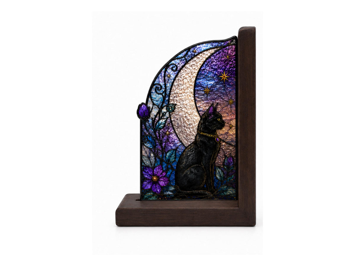 Angled view of the witch and black cat glass artwork