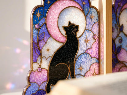 Detail view of the black cat stained glass artwork