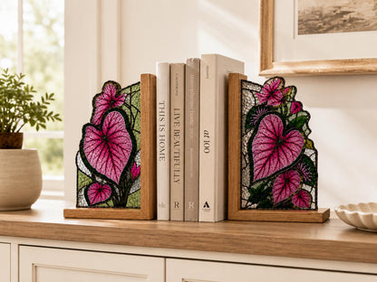 Leaf glass bookend set near a bright window