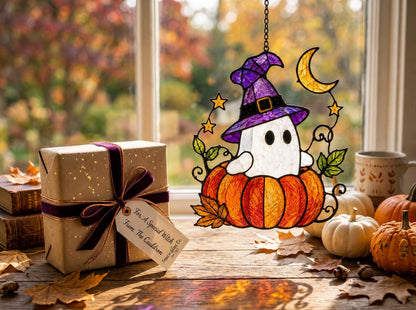 Halloween Ghost glass hanging suncatcher near a bright window