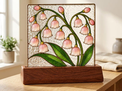 Pink Lily of the Valley stained glass tabletop glass decor in a styled home interior