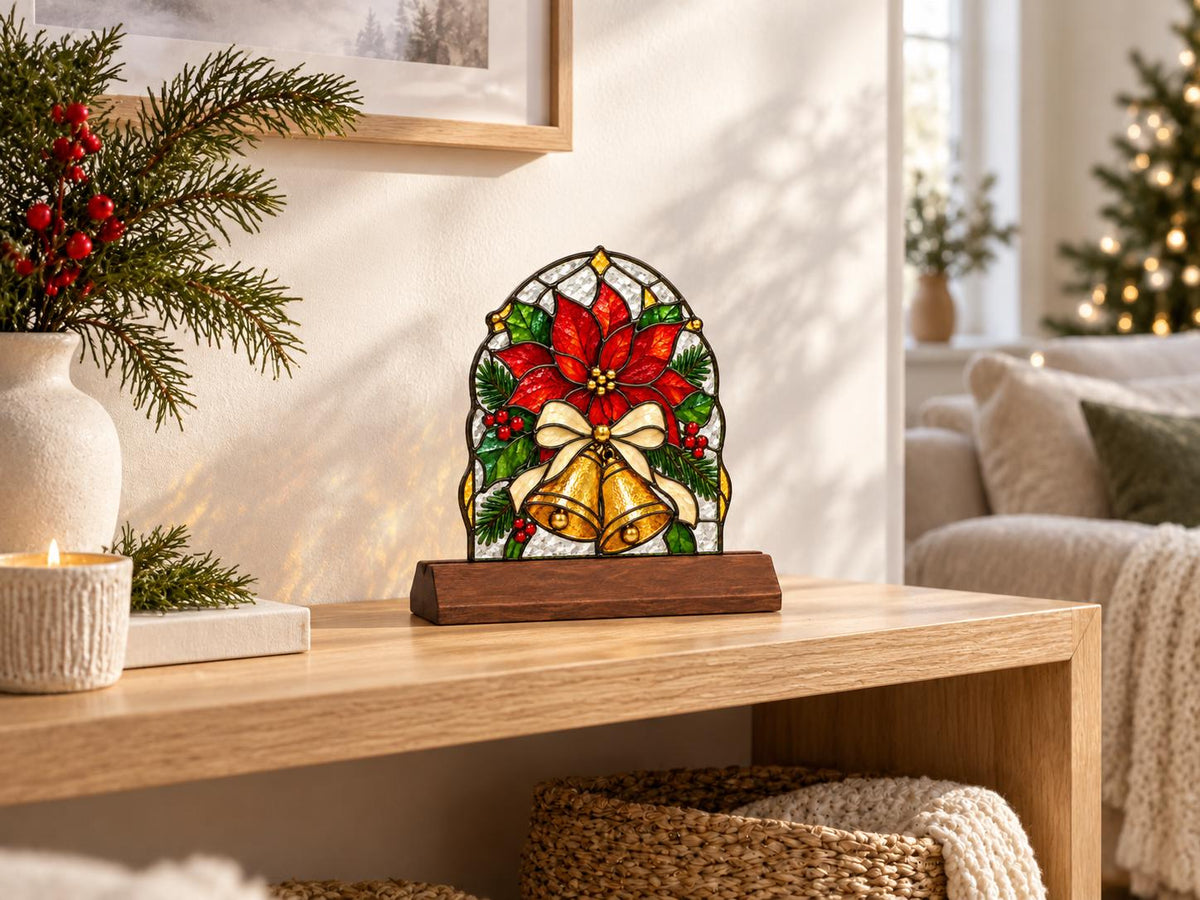 Poinsettia Bell Christmas glass tabletop glass decor near a bright window